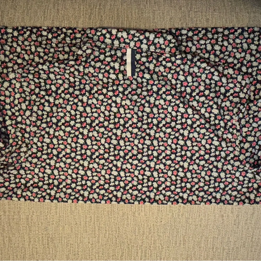 Rhoback Polo with Floral Pattern in Black, Red, and White - Picture 4 of 4